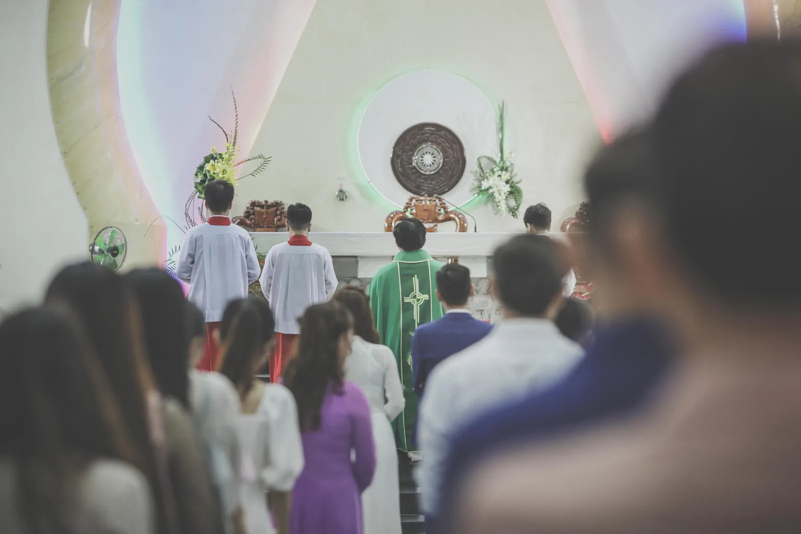 People in line walking toward the altar for Communion.