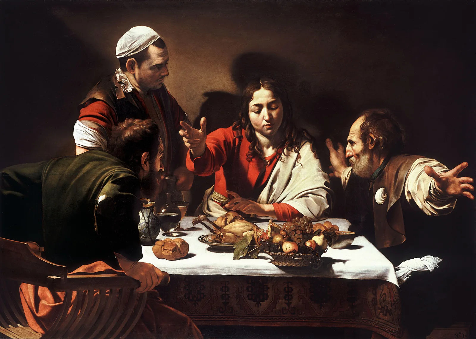 Caravaggio’s Supper at Emmaus: the risen Jesus blesses the bread; one disciple grips his chair, the other flings his arms wide.